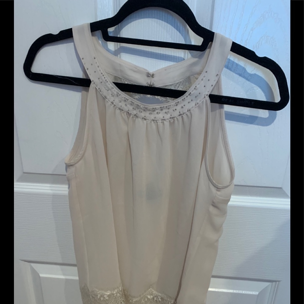 Cream Sleeveless Blouse
